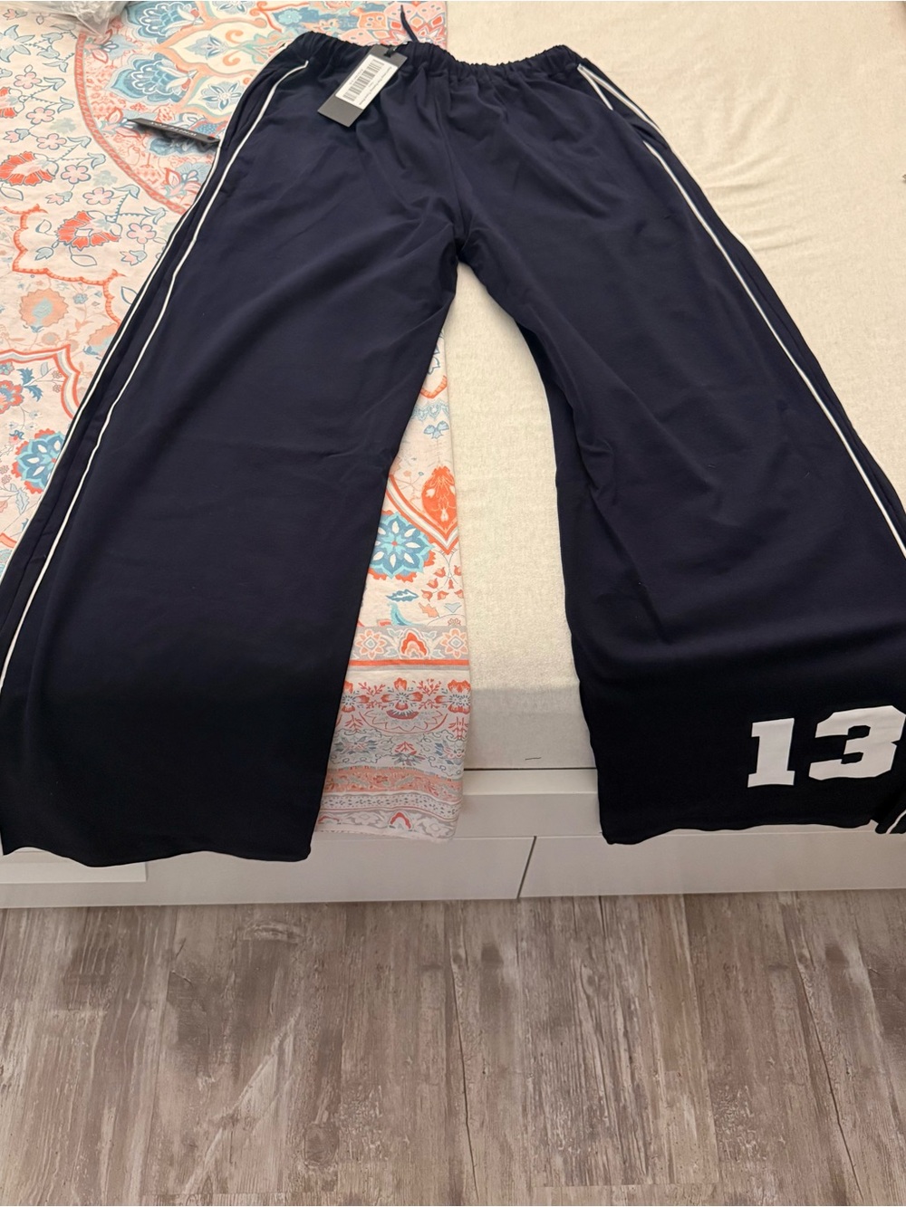 White Fox Boutique Navy Wide-Leg Track Pants with White Stripes and '13' Accent